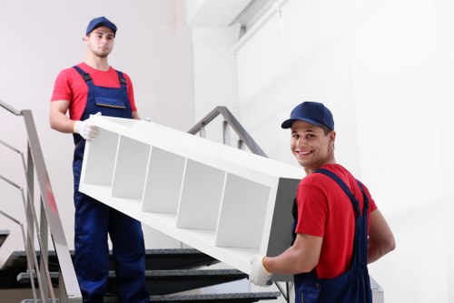 Moving van and packed boxes for house removals in Eltham