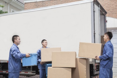 Packed boxes and furniture prepared for small removals in Eltham